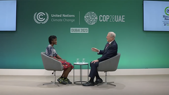 al gore and vanessa nikate sit across from each other during an interview